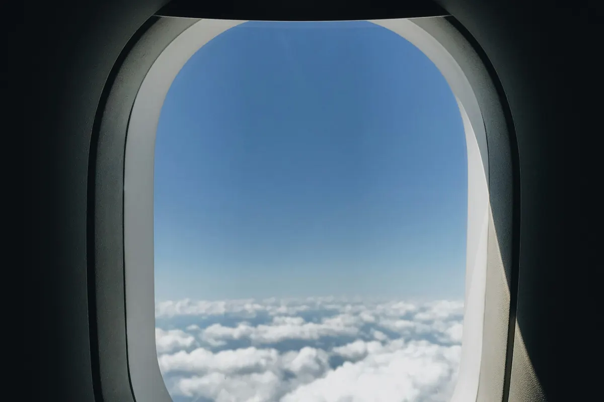 View of clouds through an aircraft window